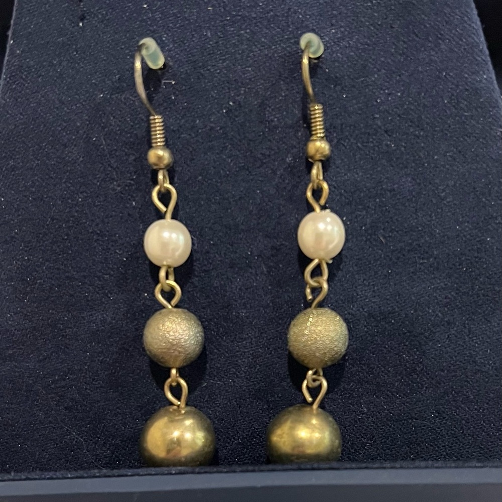 Elegant Gold and Cream Dangle Earrings